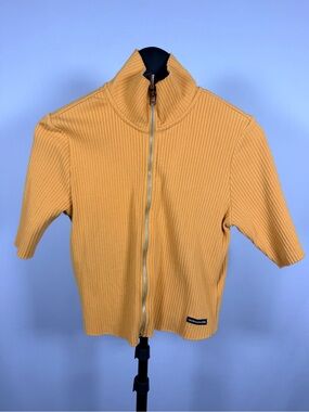 Calvin Klein Jeans Ribbed Short Sleeve Zip-Front Top in Mustard
